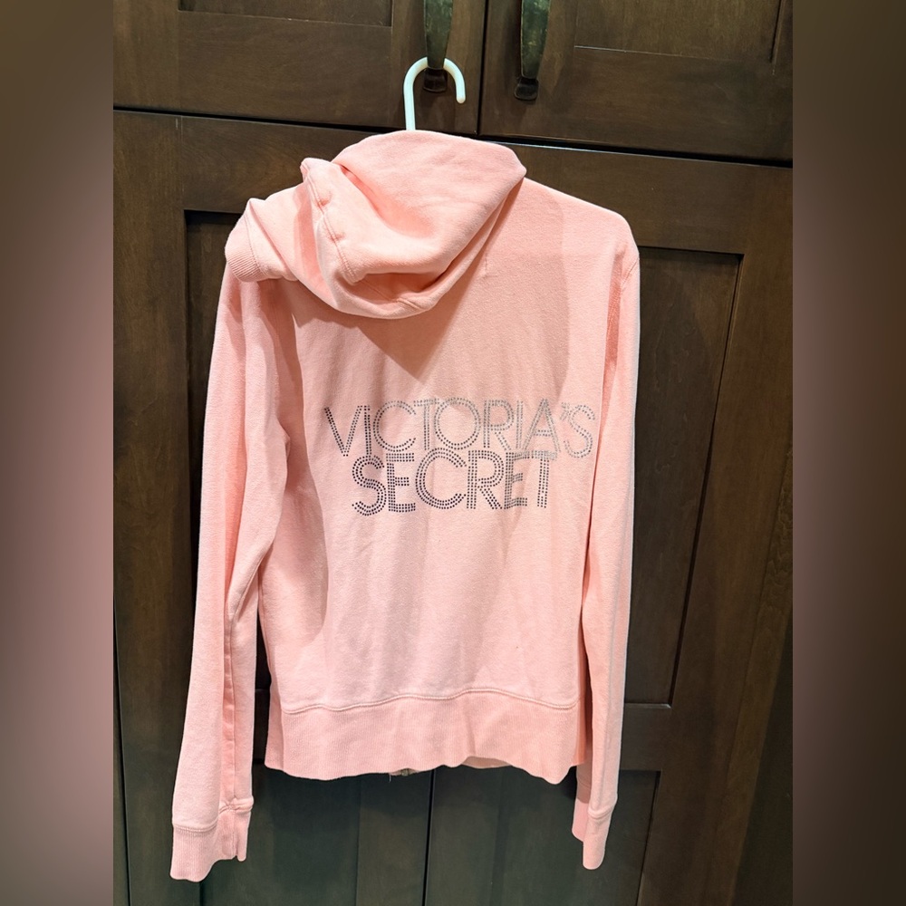 Victoria's Secret Light apricot colored hoodie.